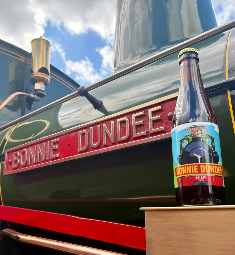 Cleethorpes Coast Light Railway locomotive Bonnie Dundee with custom illustrated beer bottle