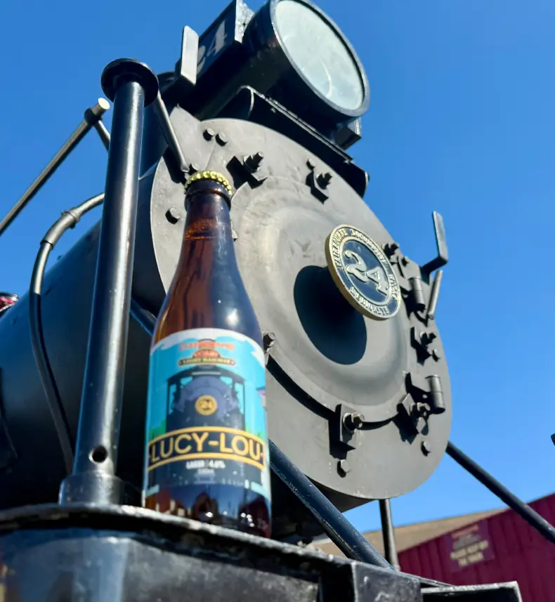 Cleethorpes Coast Light Railway locomotive Lucy-Lou with custom illustrated beer bottle