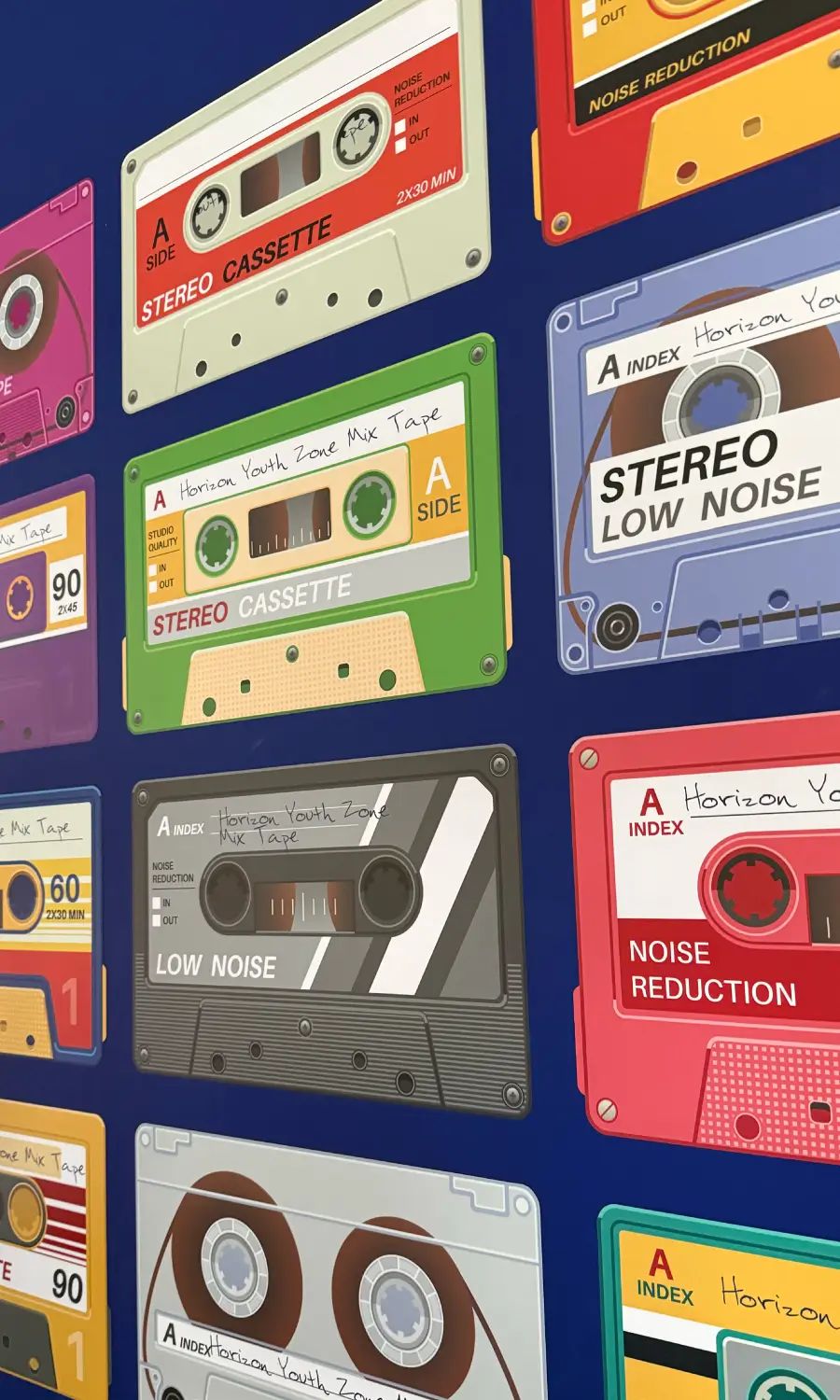 Horizon Youth Zone Murals featuring cassettes with different names