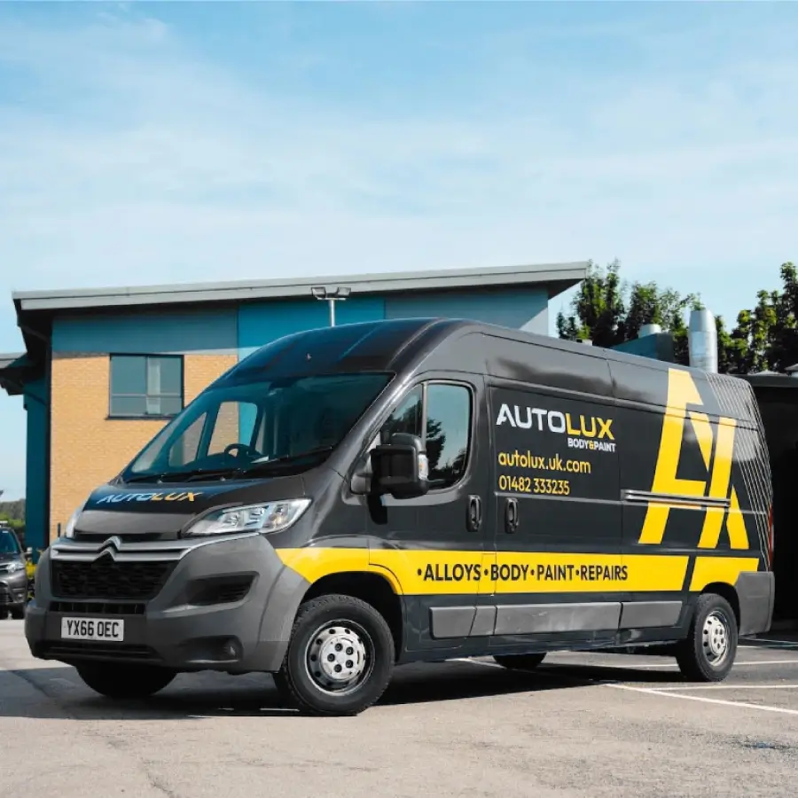 An autolux black Van parked up