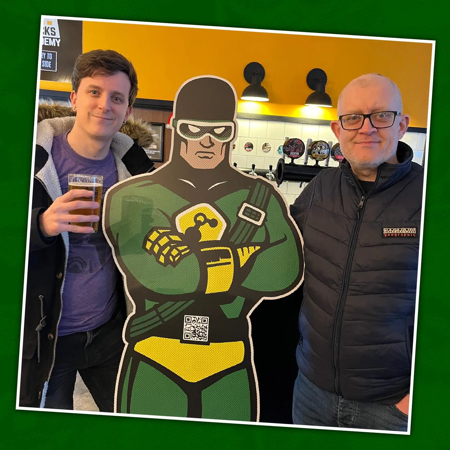 Sourcefour duo Robert Pritchard and Kirk Arnold pose with their design for the Docks beers & CATCH Collabration