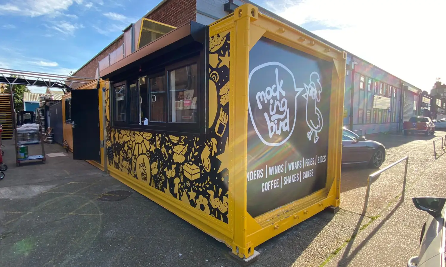 Mockingbird-branded container on a street