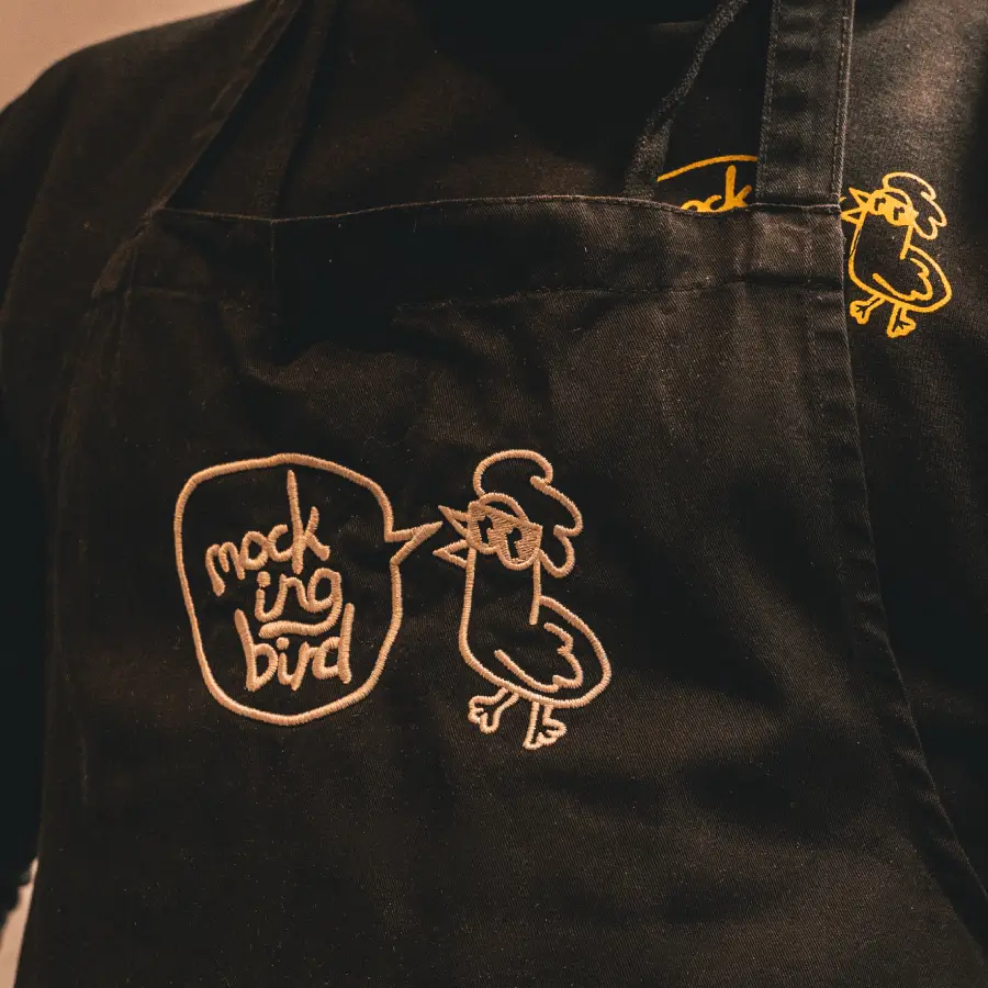 Mocking bird uniform with a mockingbird apron