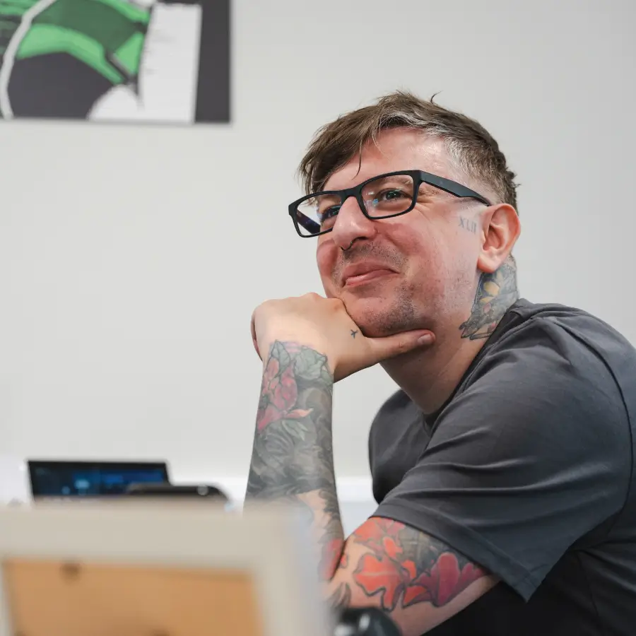 Jon, a Sourcefour employee looking happy and smiling